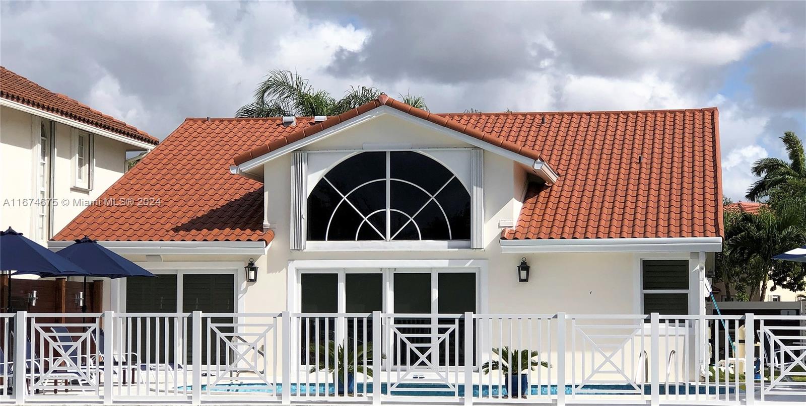 a front view of a house with a balcony