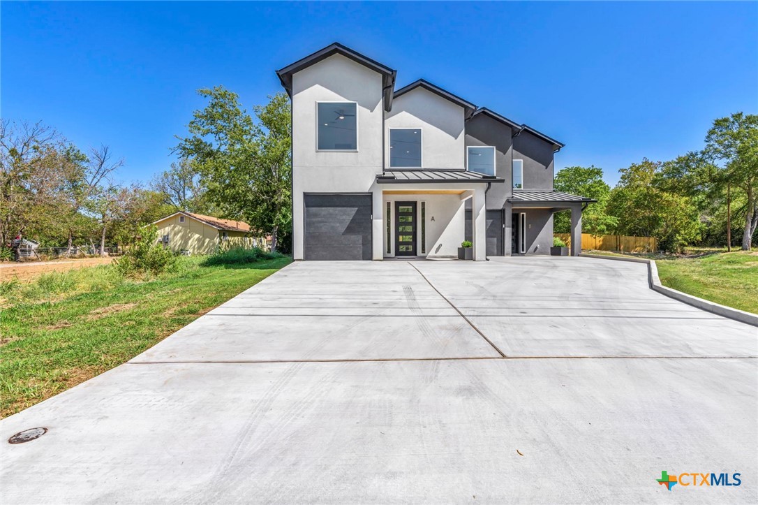 a view of house and outdoor space with yard