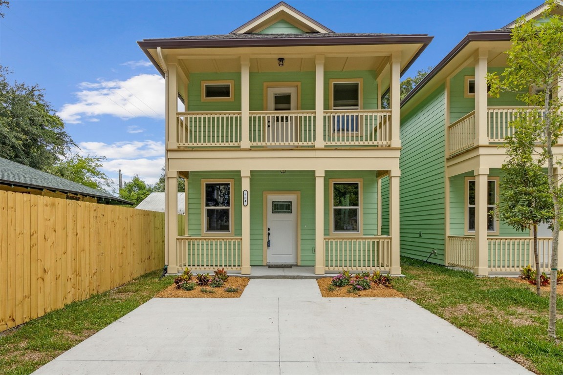 front view of a house with a garden