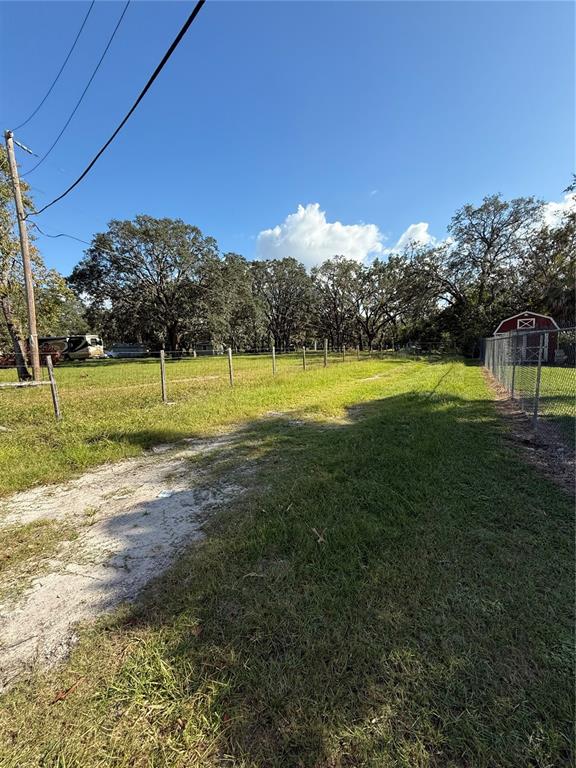 a view of an outdoor space and a yard