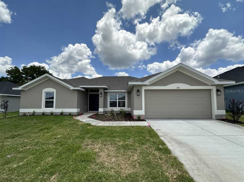 front view of house with a yard