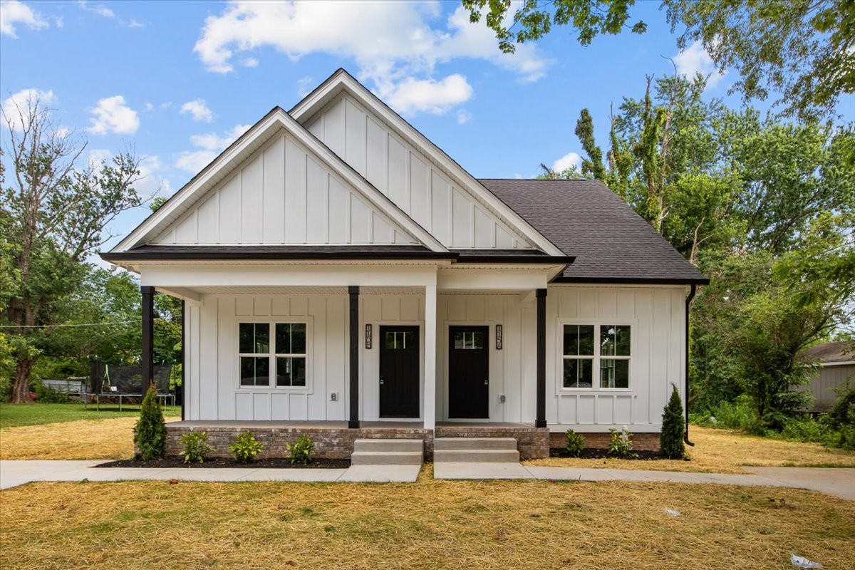 a house with trees in the background