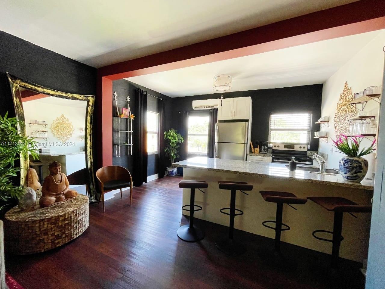 a view of a living room and dining room