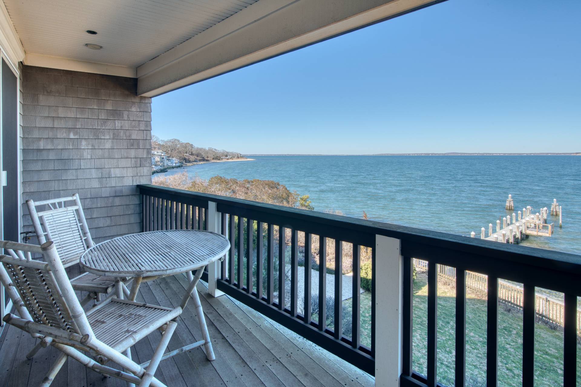 a view of a balcony with chairs