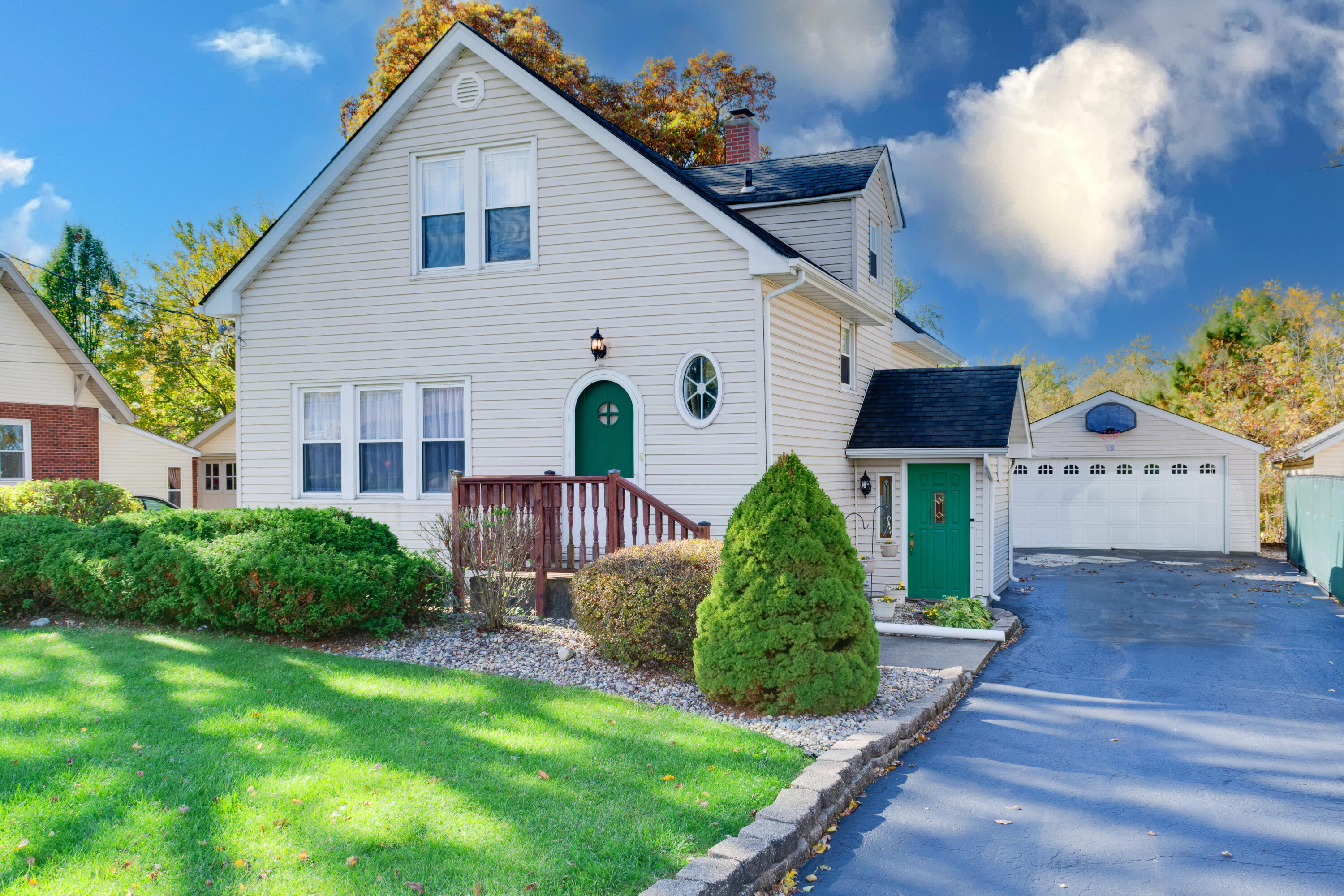 a front view of a house with garden