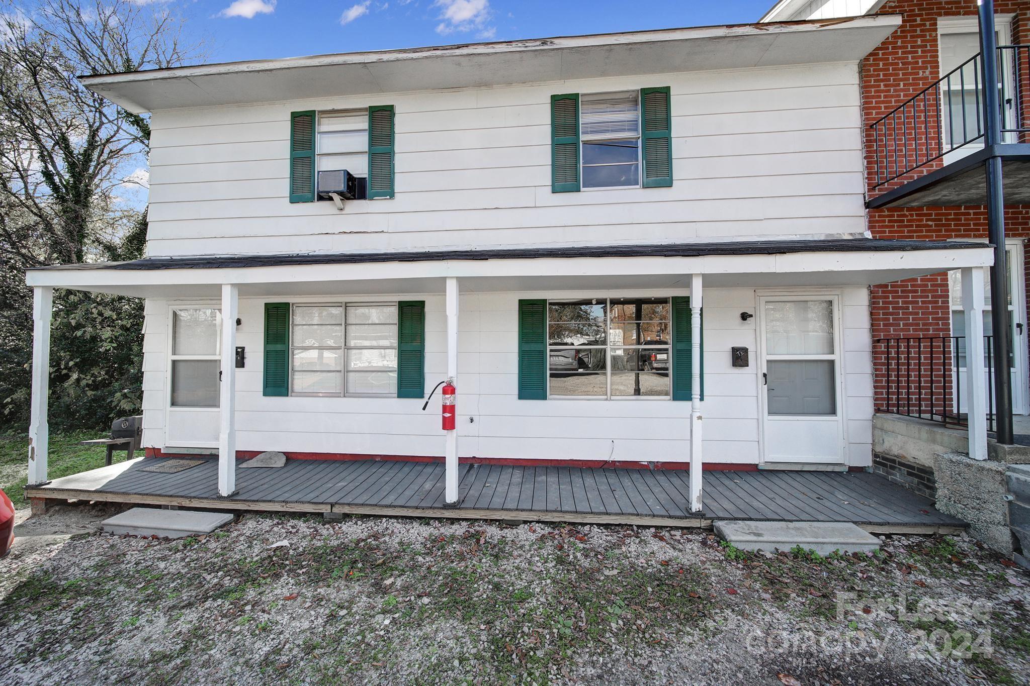 a front view of a house with porch