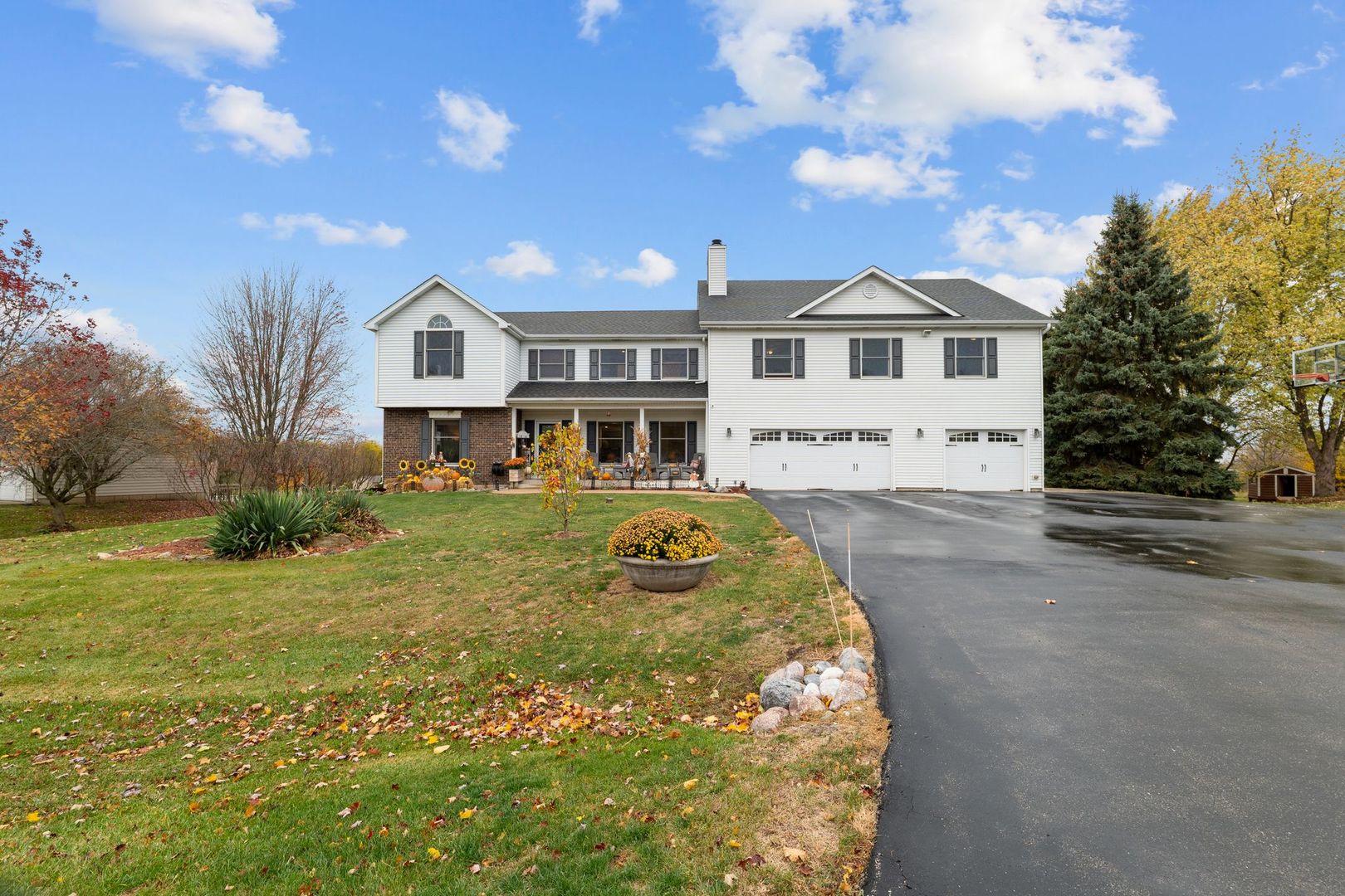 a front view of a house with a yard