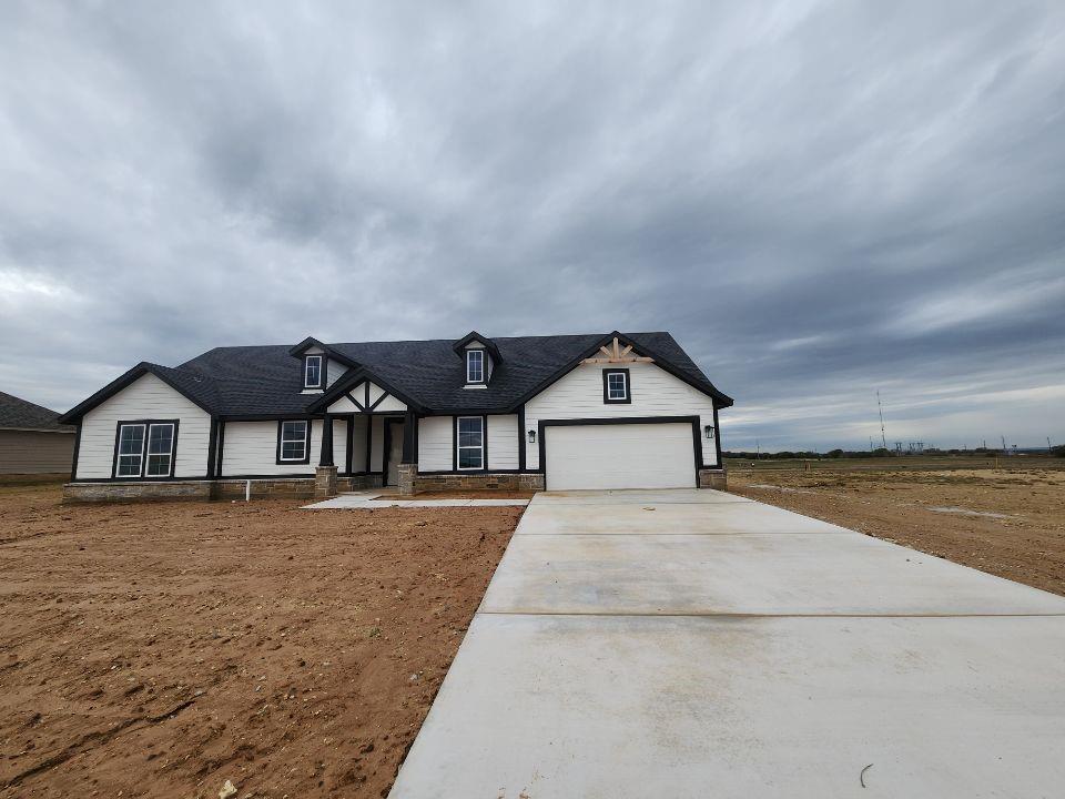 front view of house with a yard