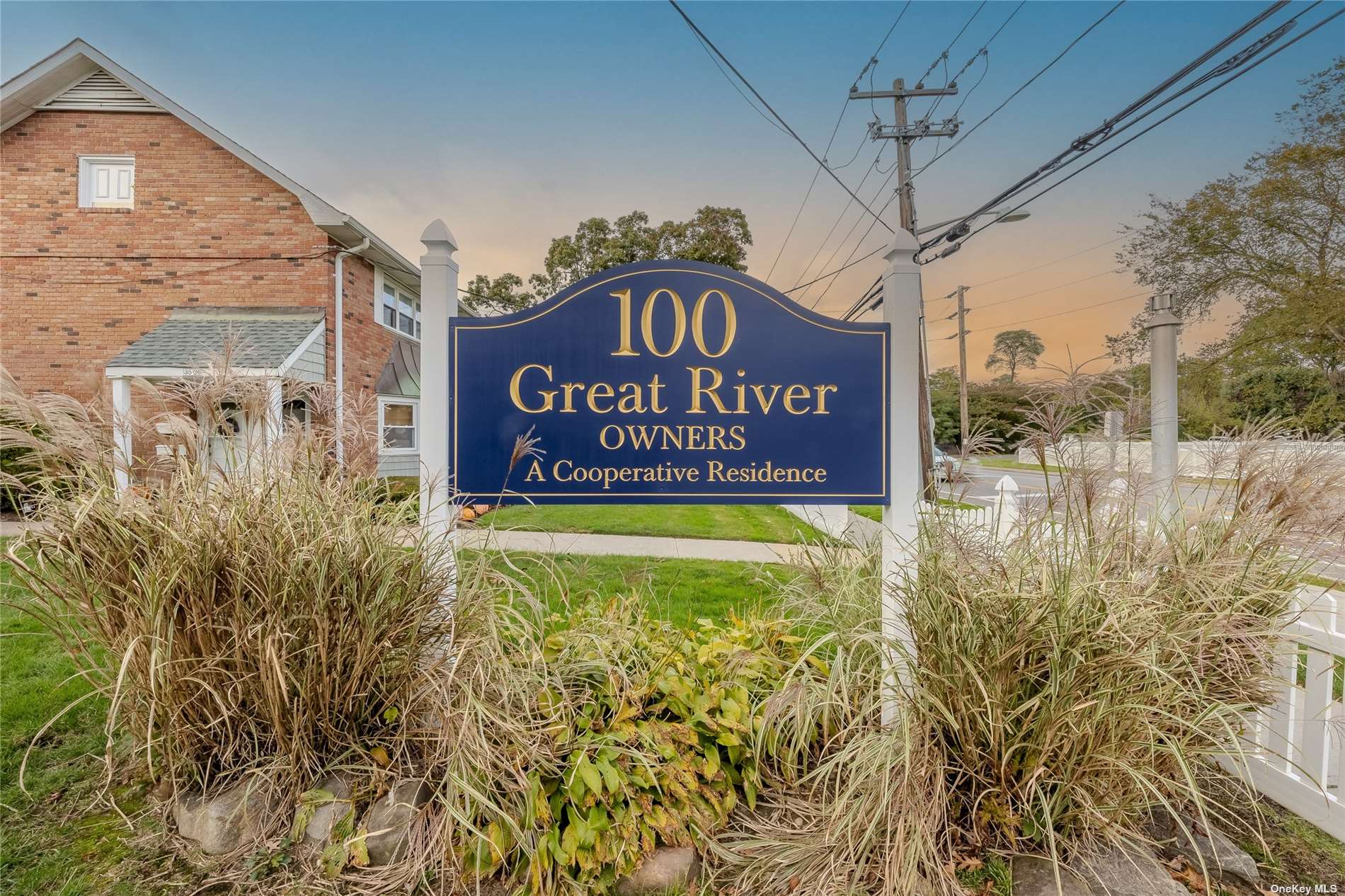 a sign broad in front of a house