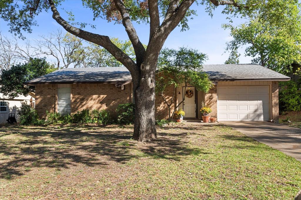 a house with trees in front of it