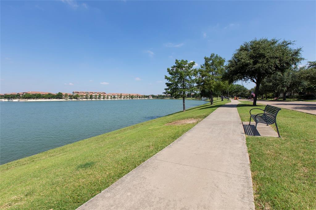 a view of a lake with a big yard