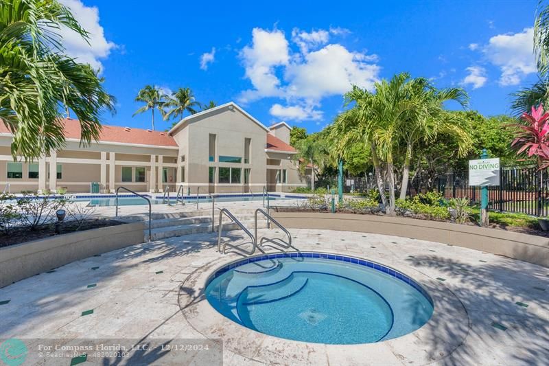 a view of a house with swimming pool