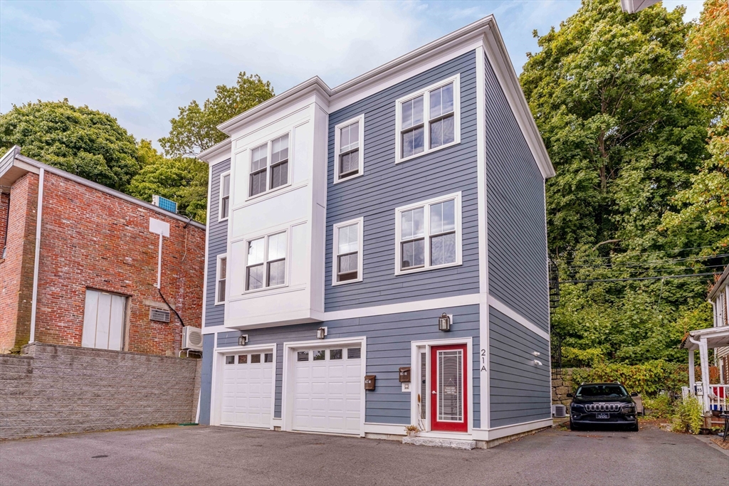 a view of a house with a garage