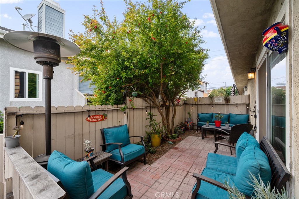 a view of a patio in backyard