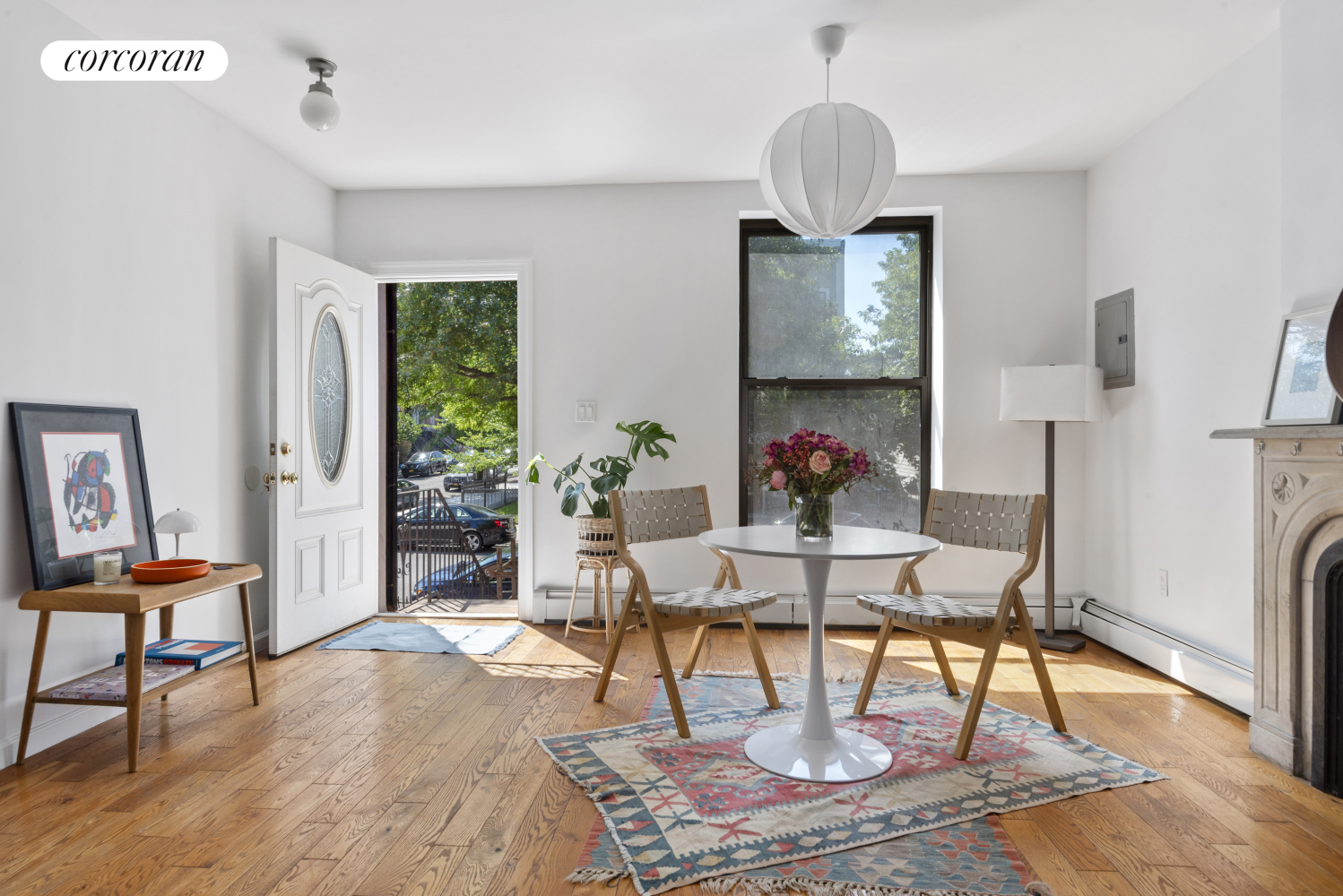 a workspace with furniture and a chandelier