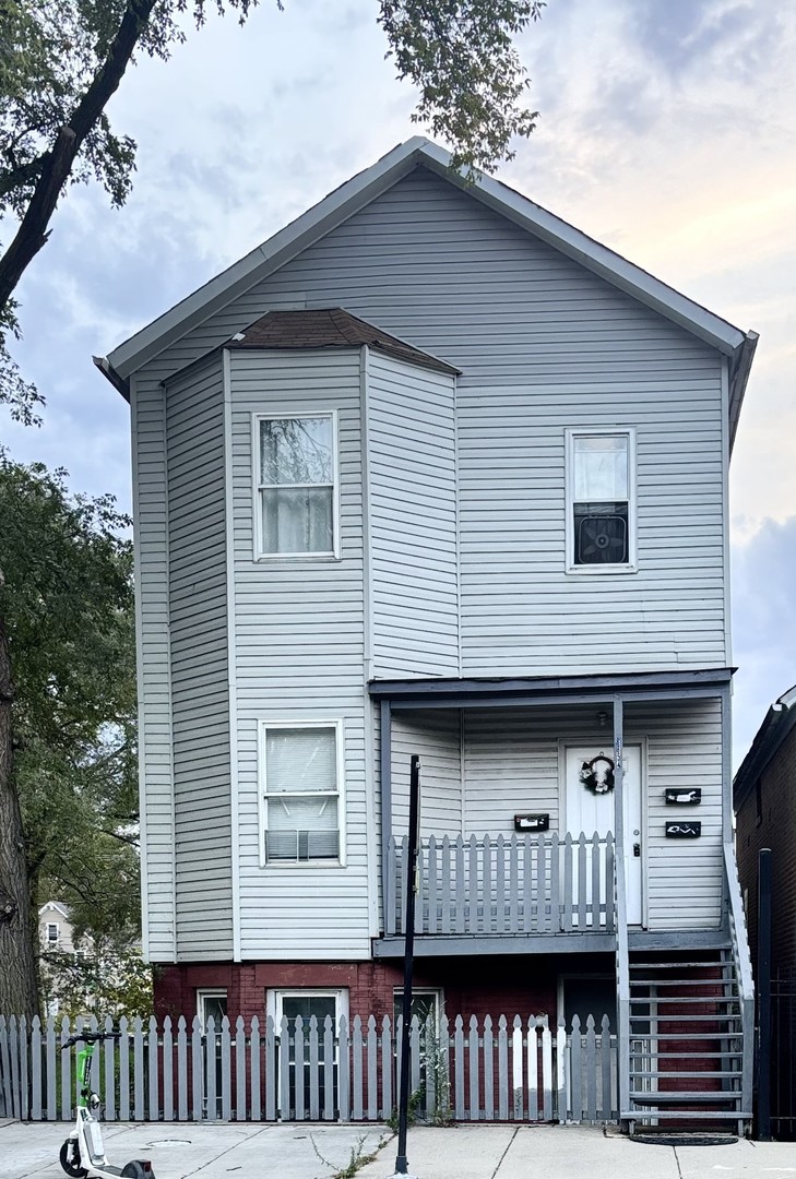 a front view of a house with balcony