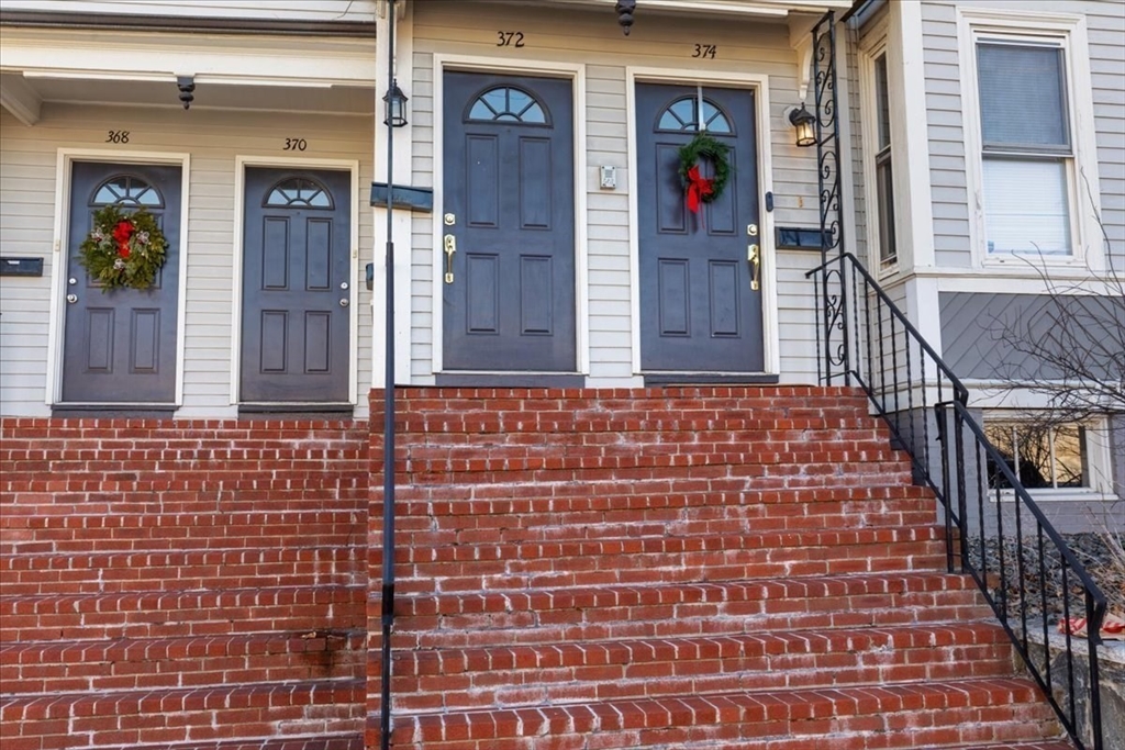 a view of a brick house with entrance