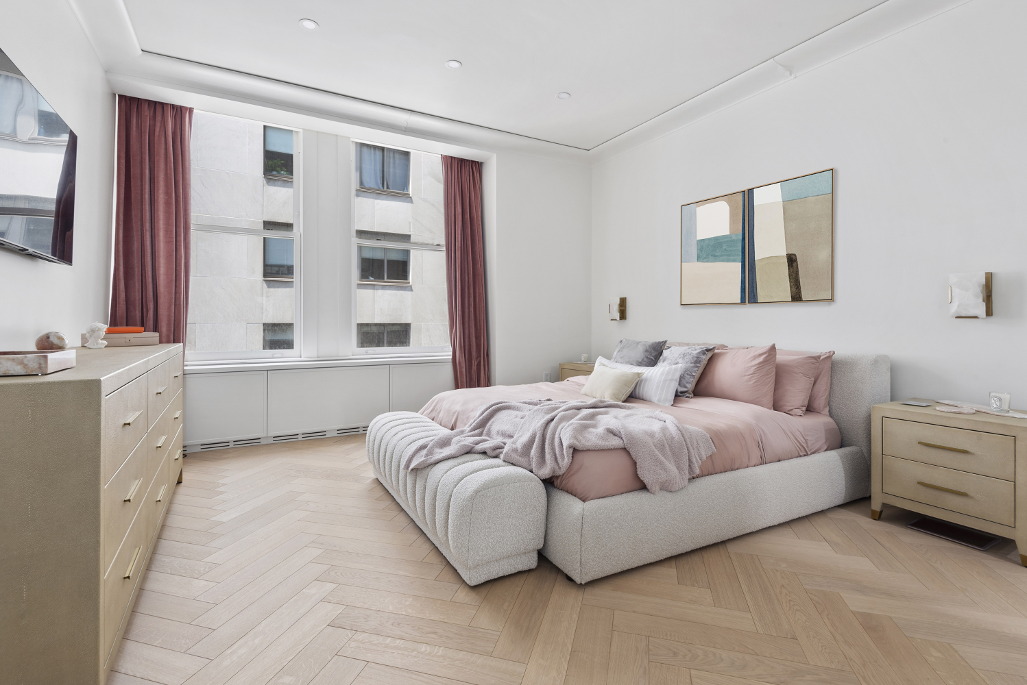 a spacious bedroom with a bed and a large mirror