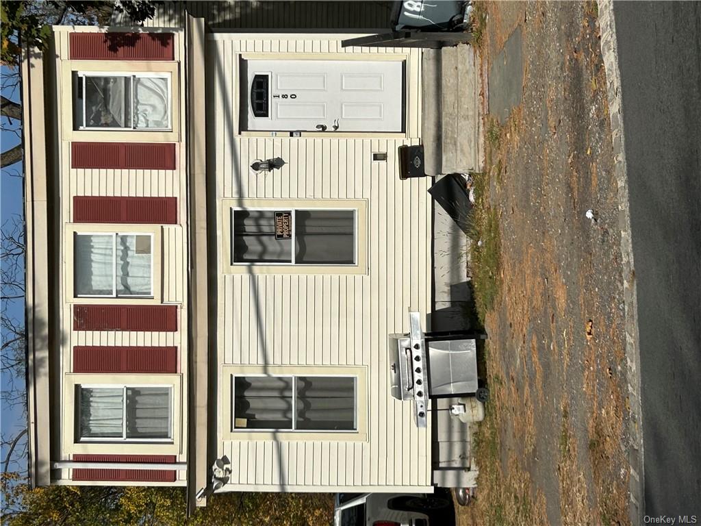 a view of a house with a patio