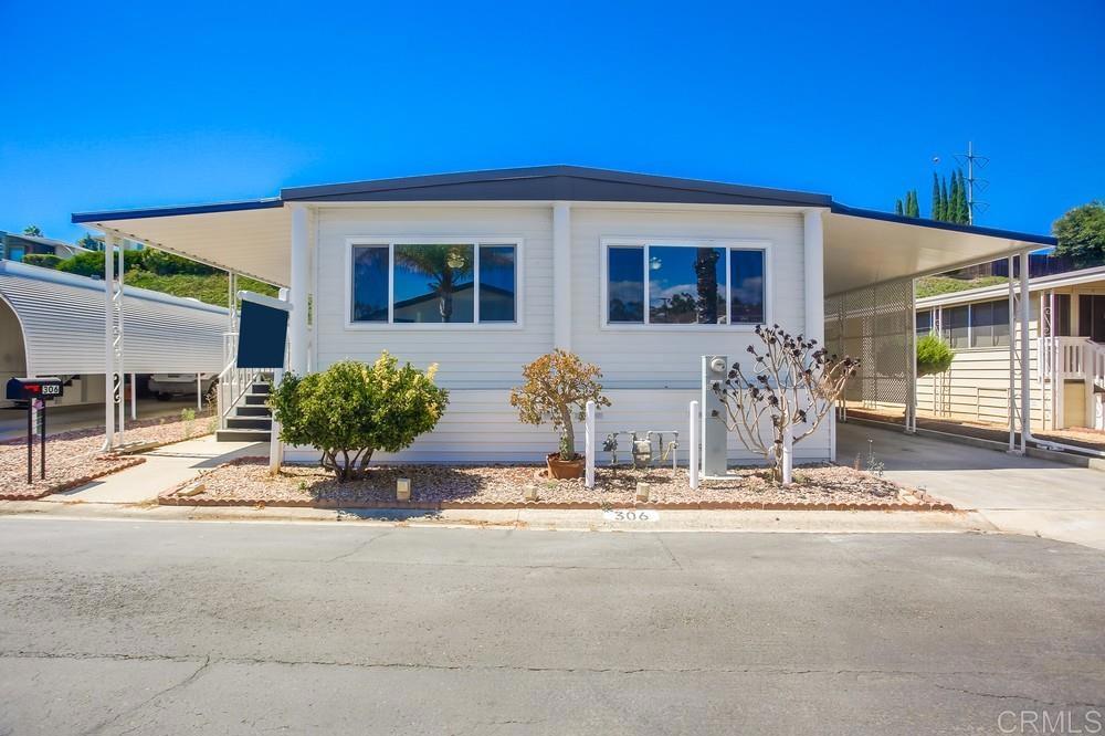 front view of a house with a patio