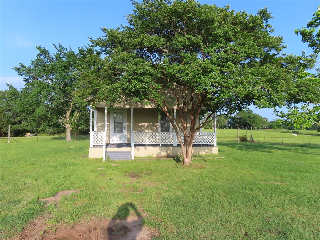 a house view with a garden space