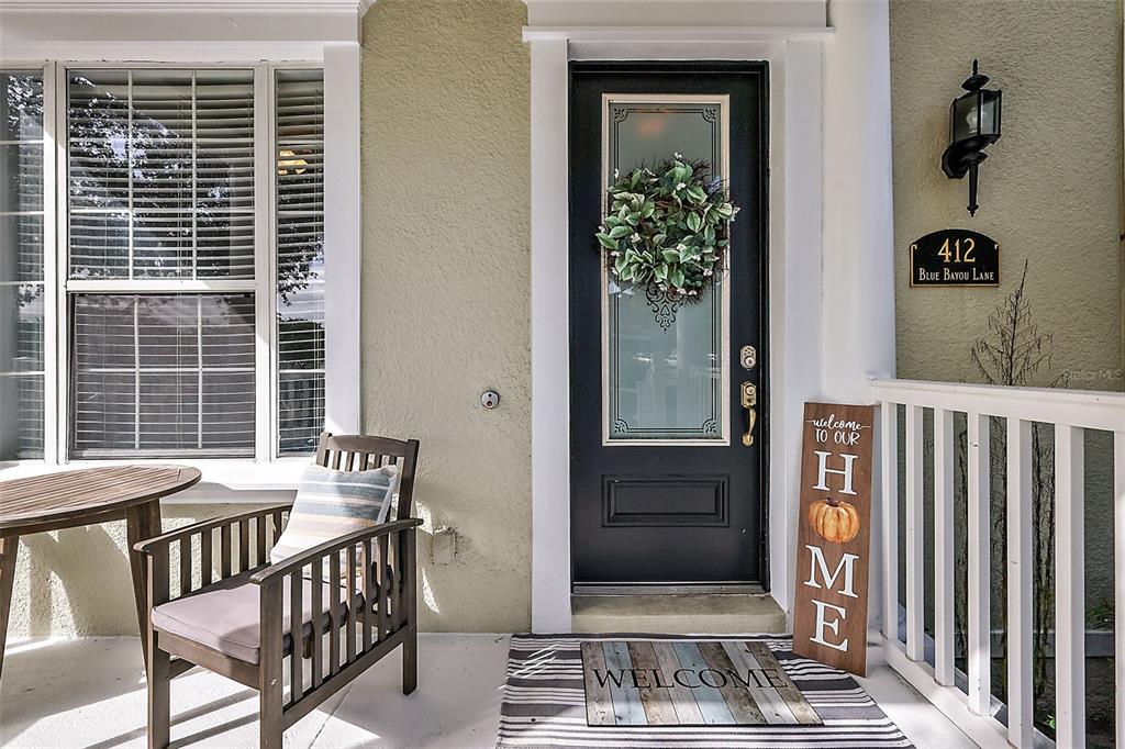 a balcony view with a outdoor seating space