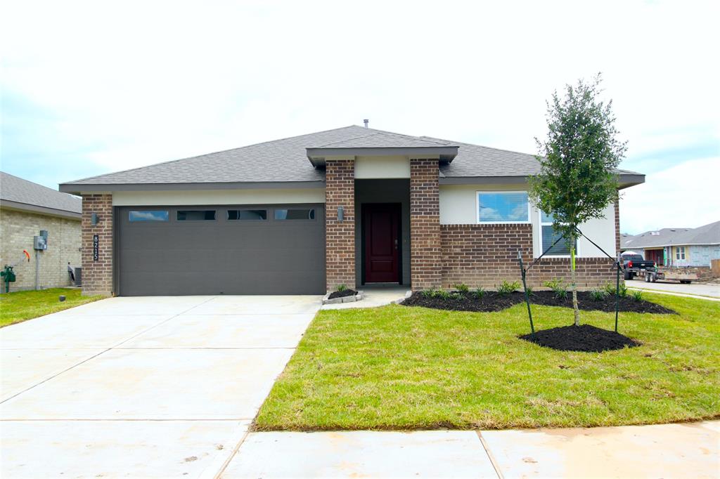 a view of house with swimming pool outdoor seating