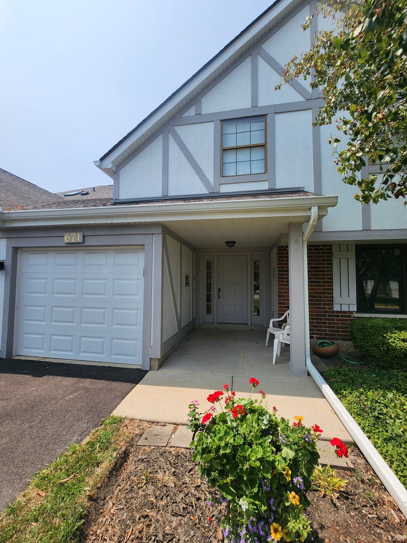 a front view of a house with a porch