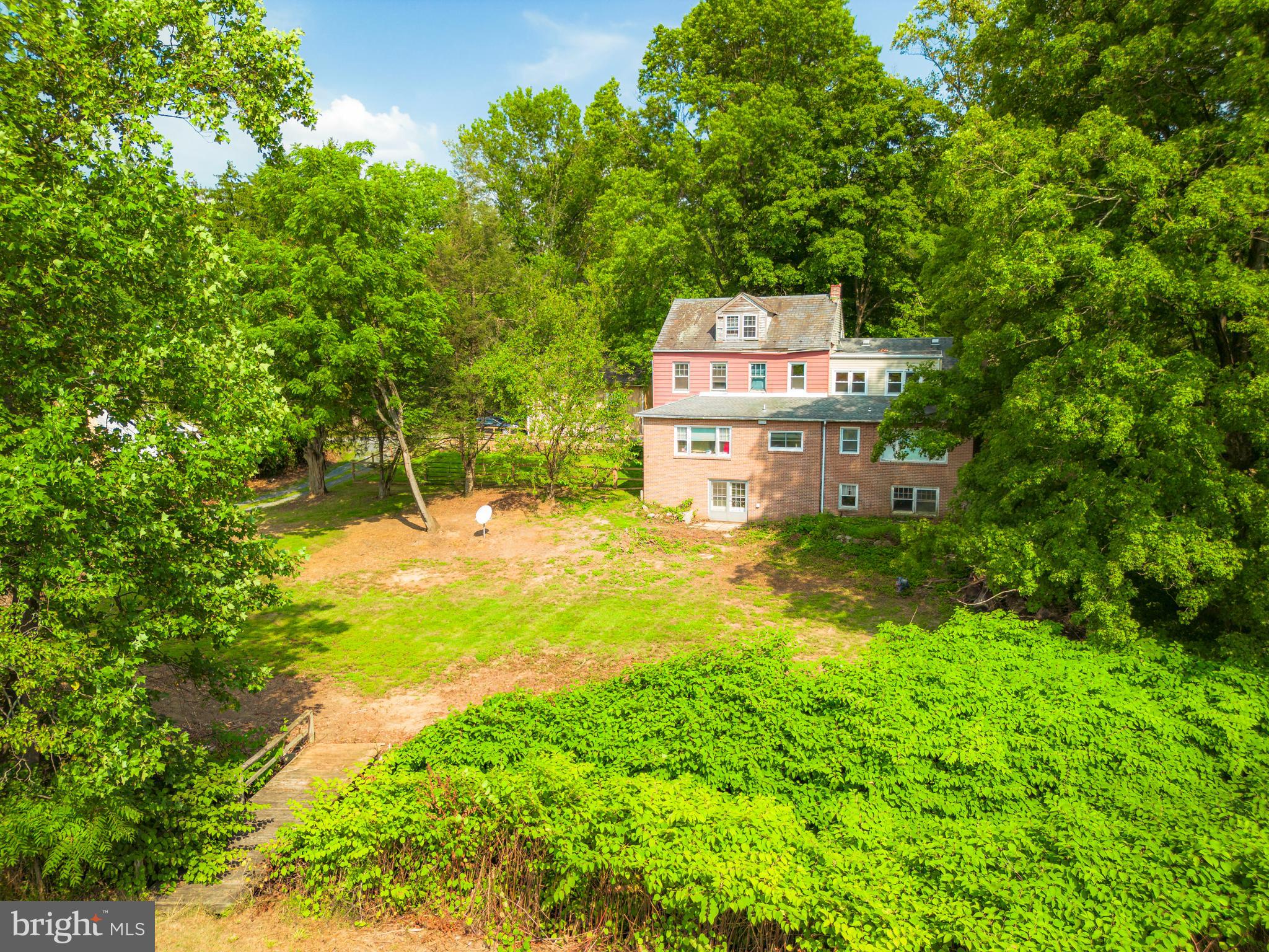 a house with trees in front of it