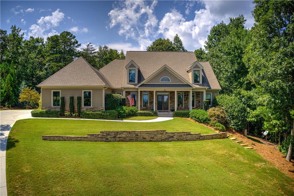 a front view of a house with a yard