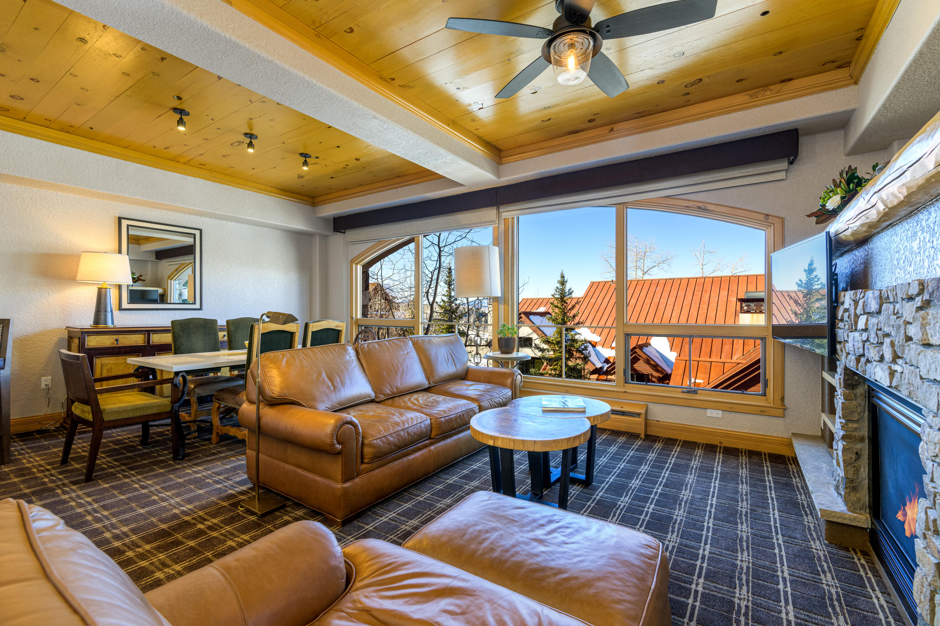 a living room with furniture and a rug