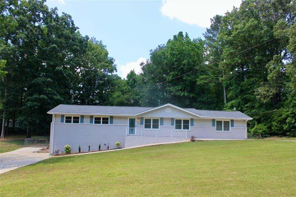 a front of a house with a yard