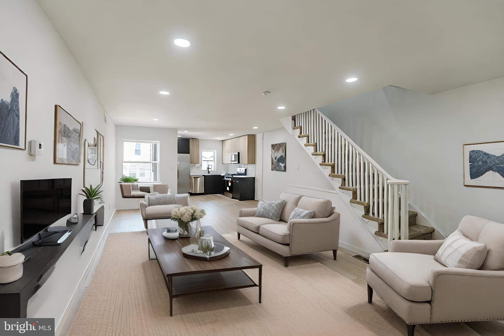 a living room with furniture fireplace and a flat screen tv