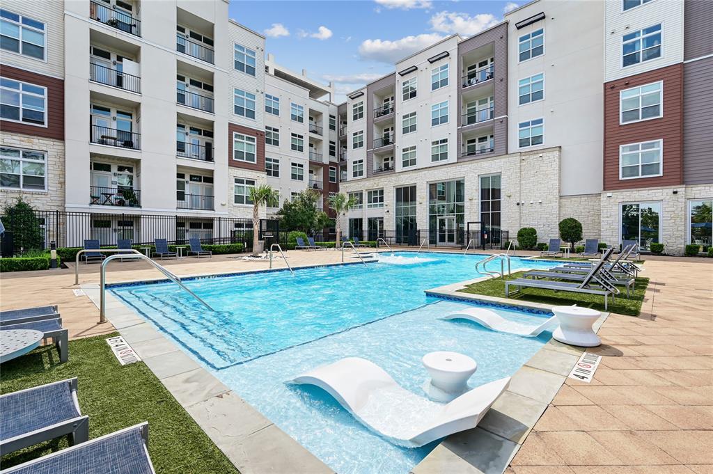 a view of a building with swimming pool