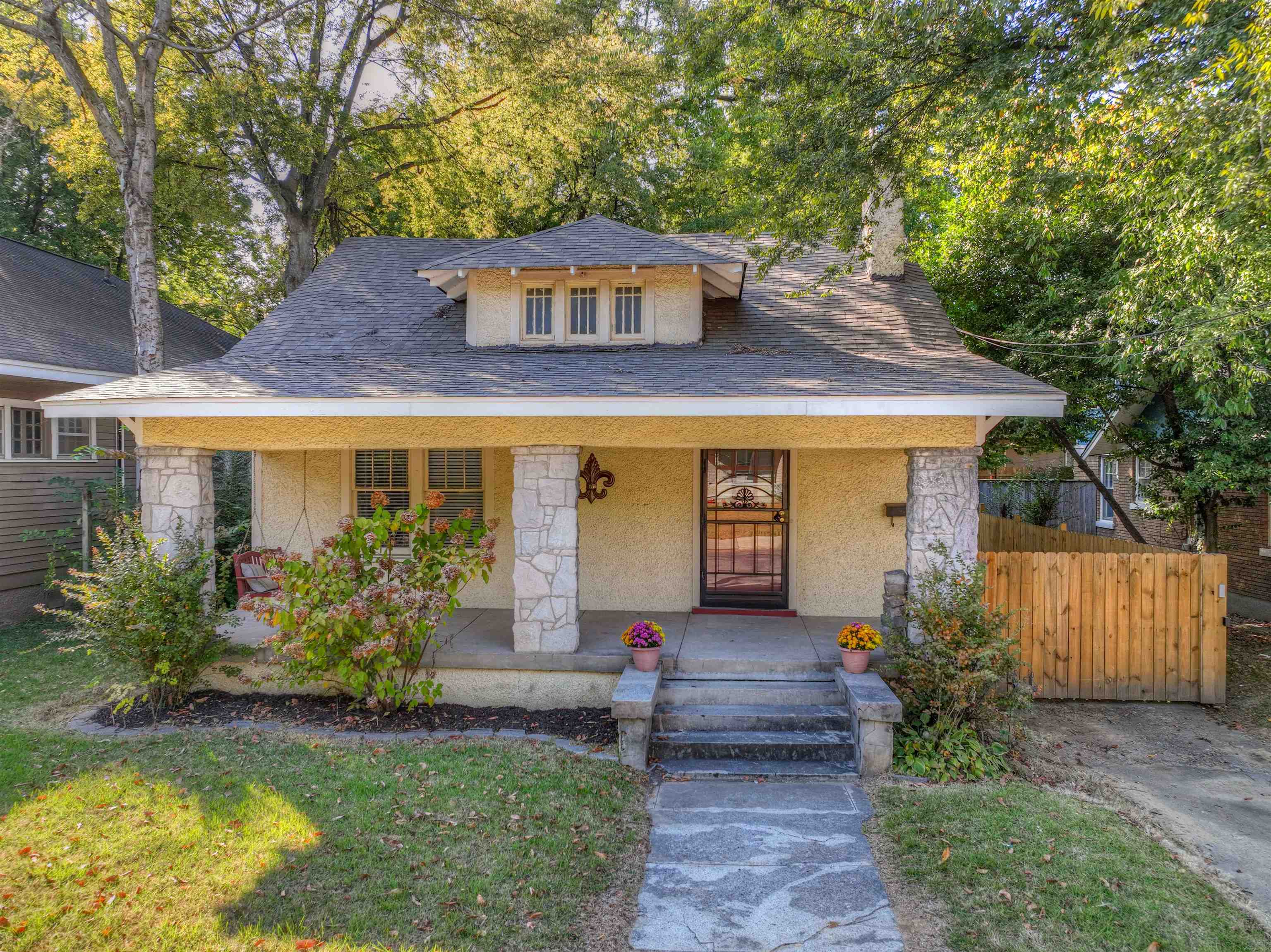 Bungalow-style home with a porch