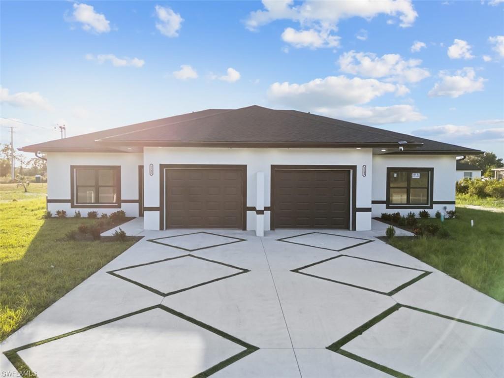 a house view with a garden space