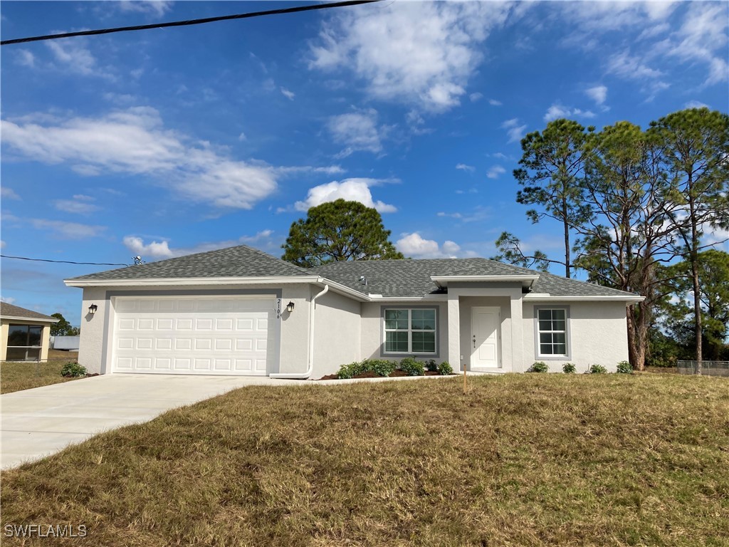 front view of a house with a yard