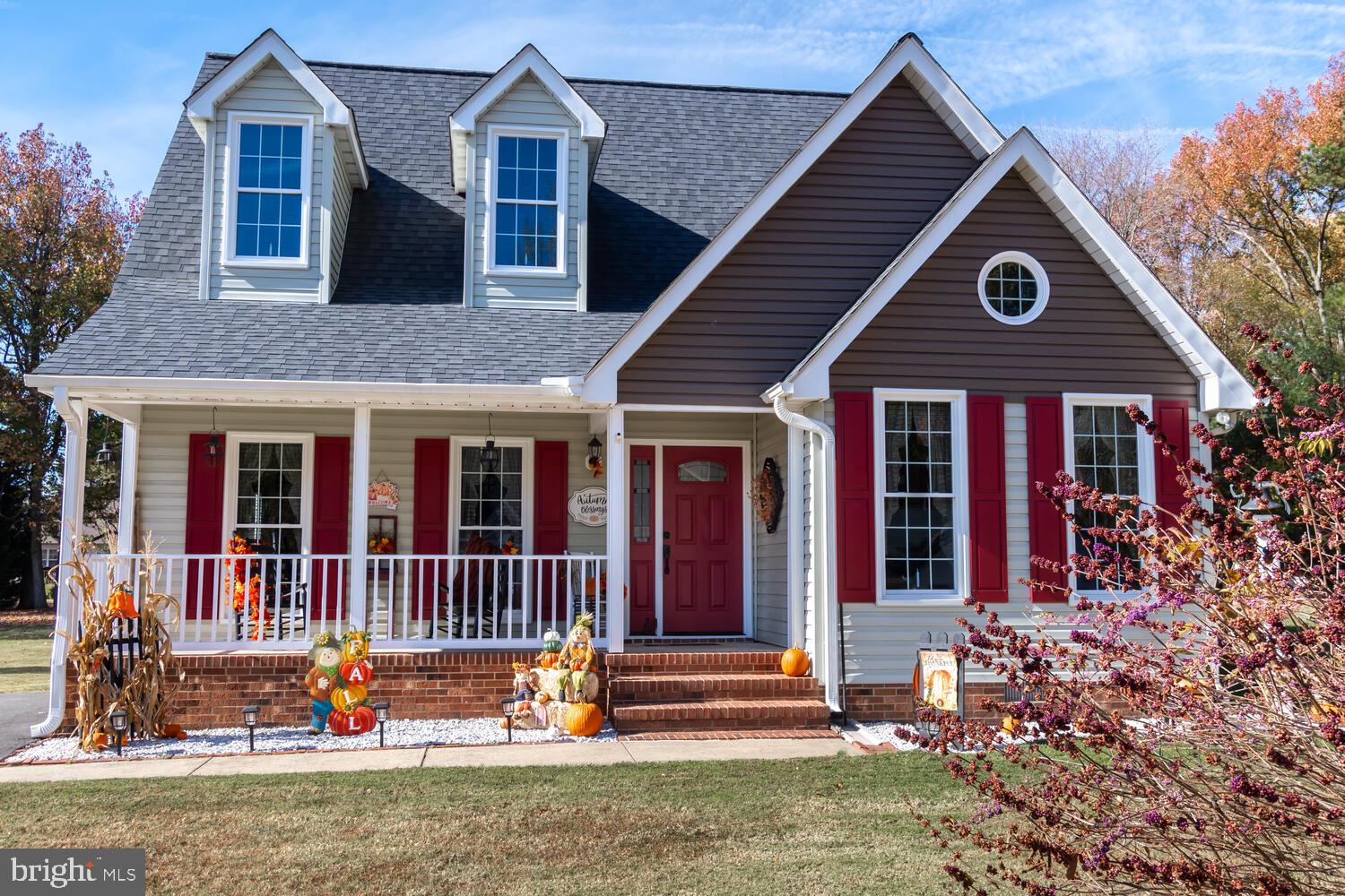 front view of a house with a yard