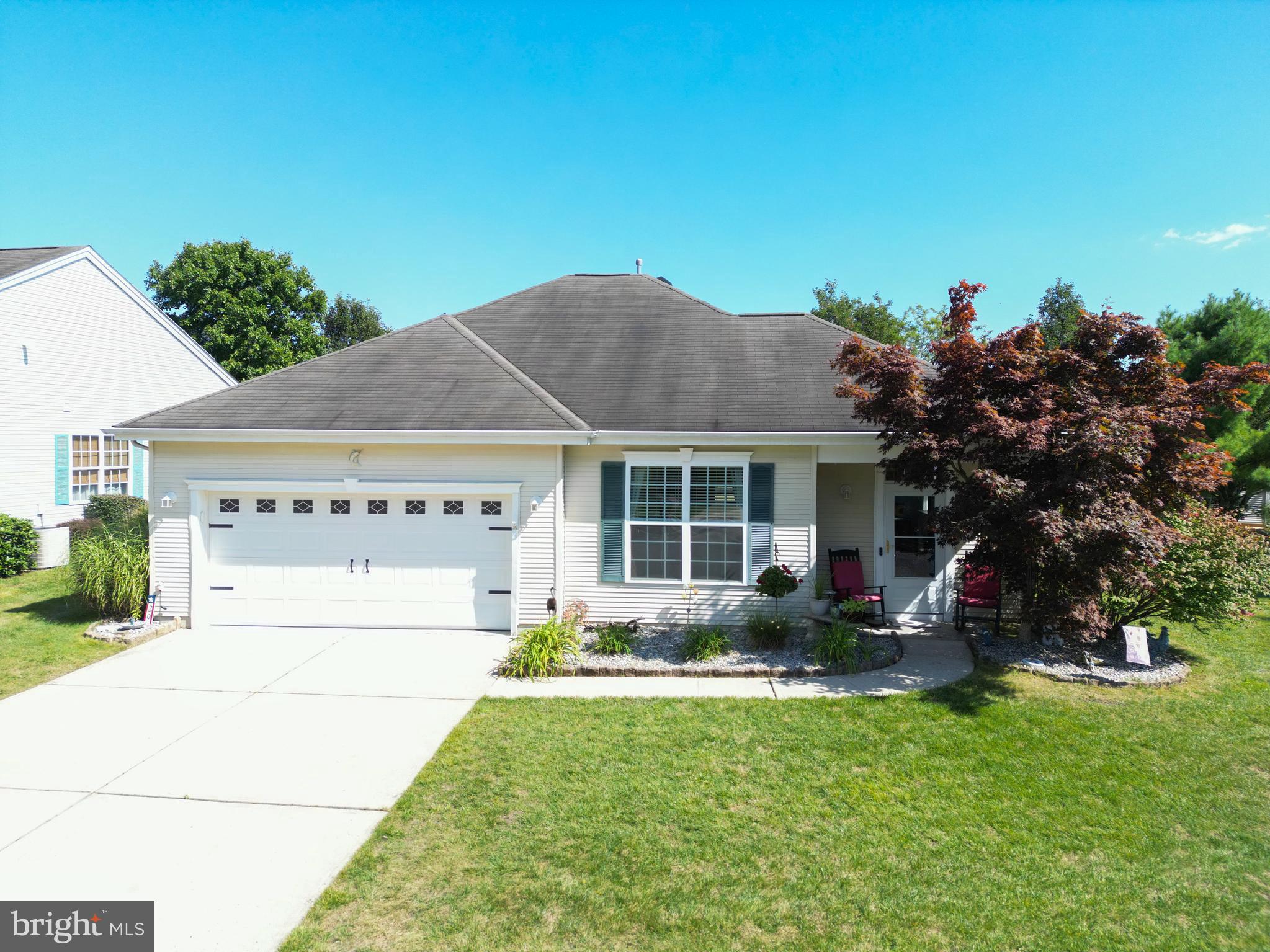 a house view with a garden space