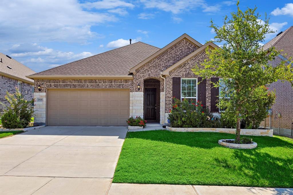 a front view of house with yard