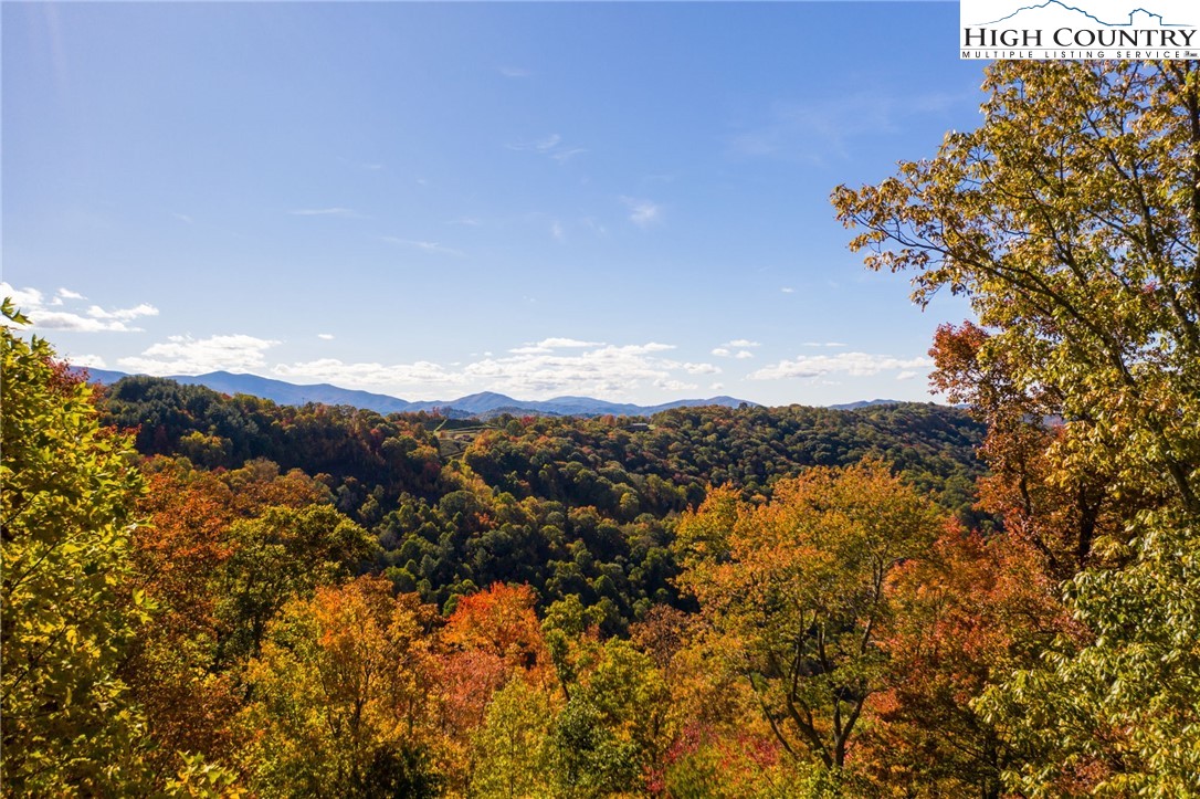 a view of mountains and valleys