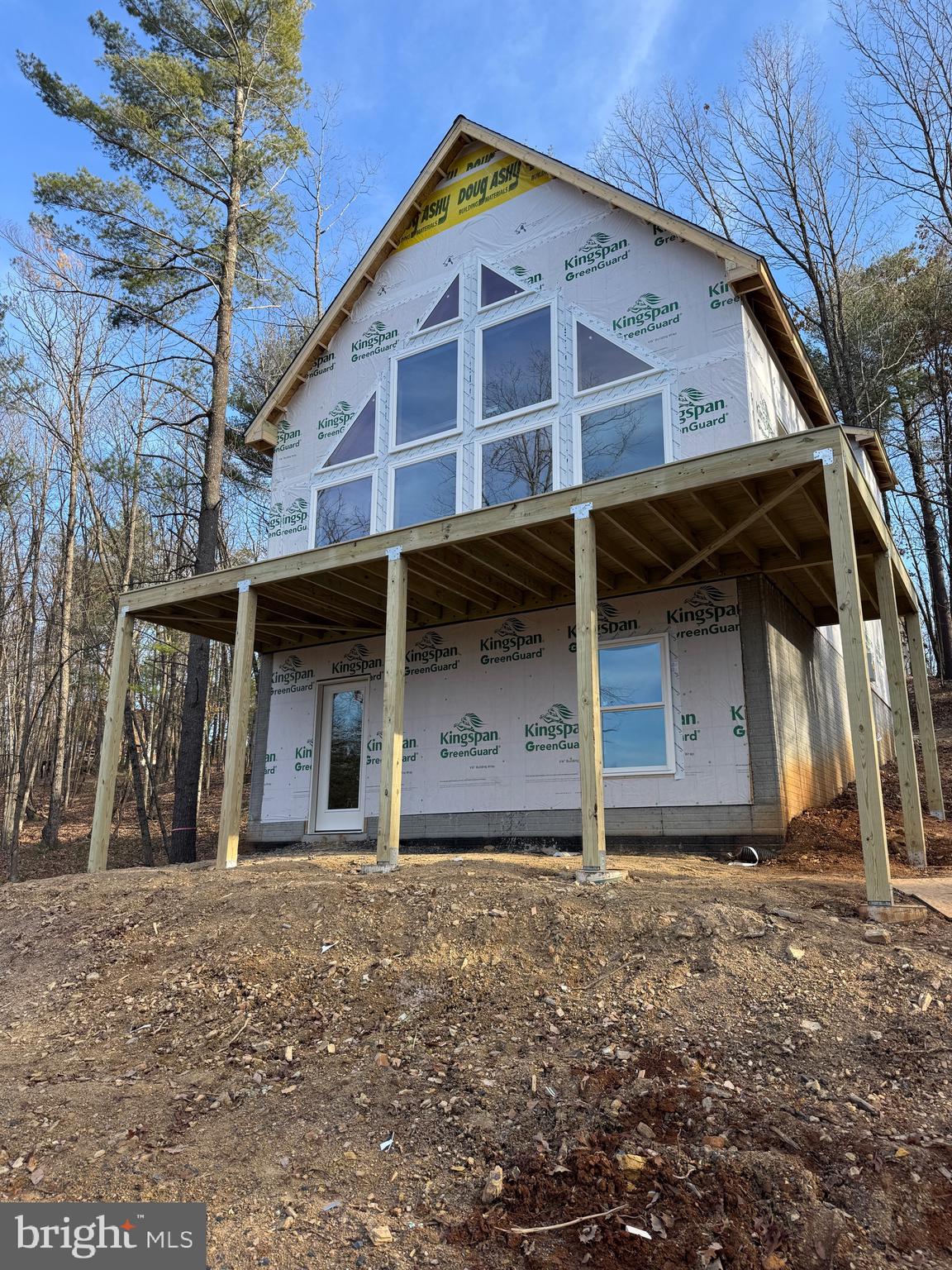 a front view of a house with garage