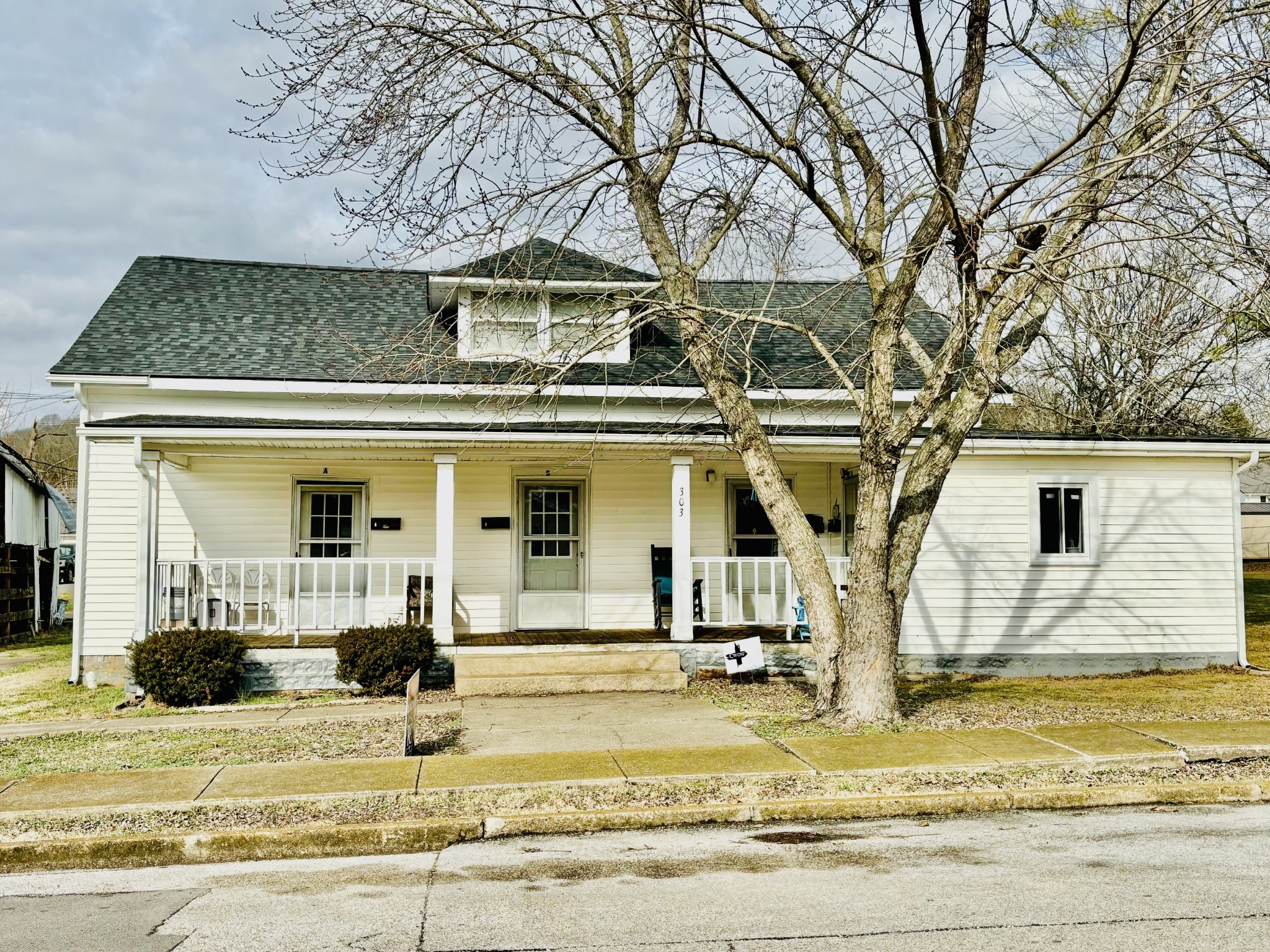 a view of a house with a park