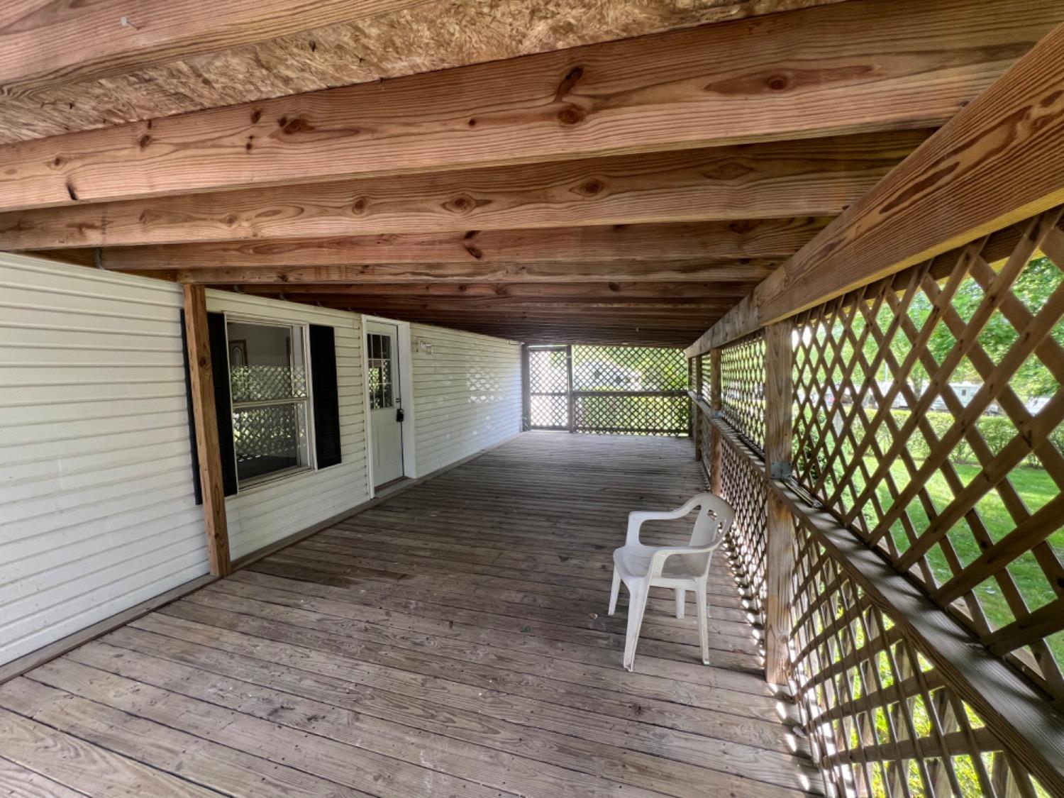 Cover front porch with room for family to gather round.