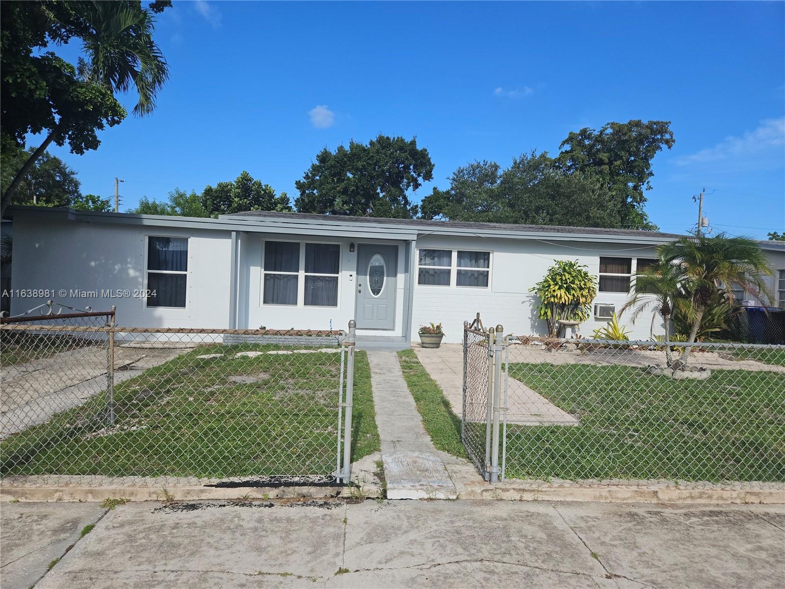 front view of a house with a patio