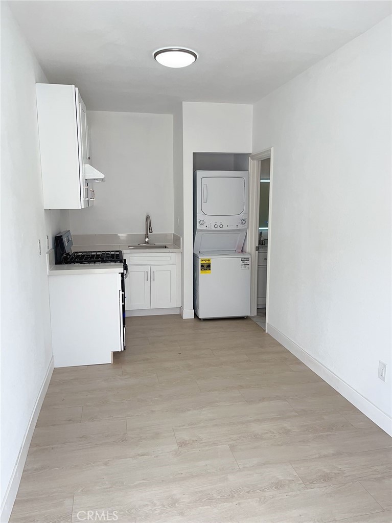 a view of a kitchen with a sink