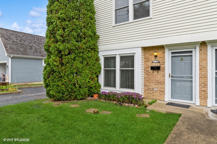 a view of a backyard with a garden