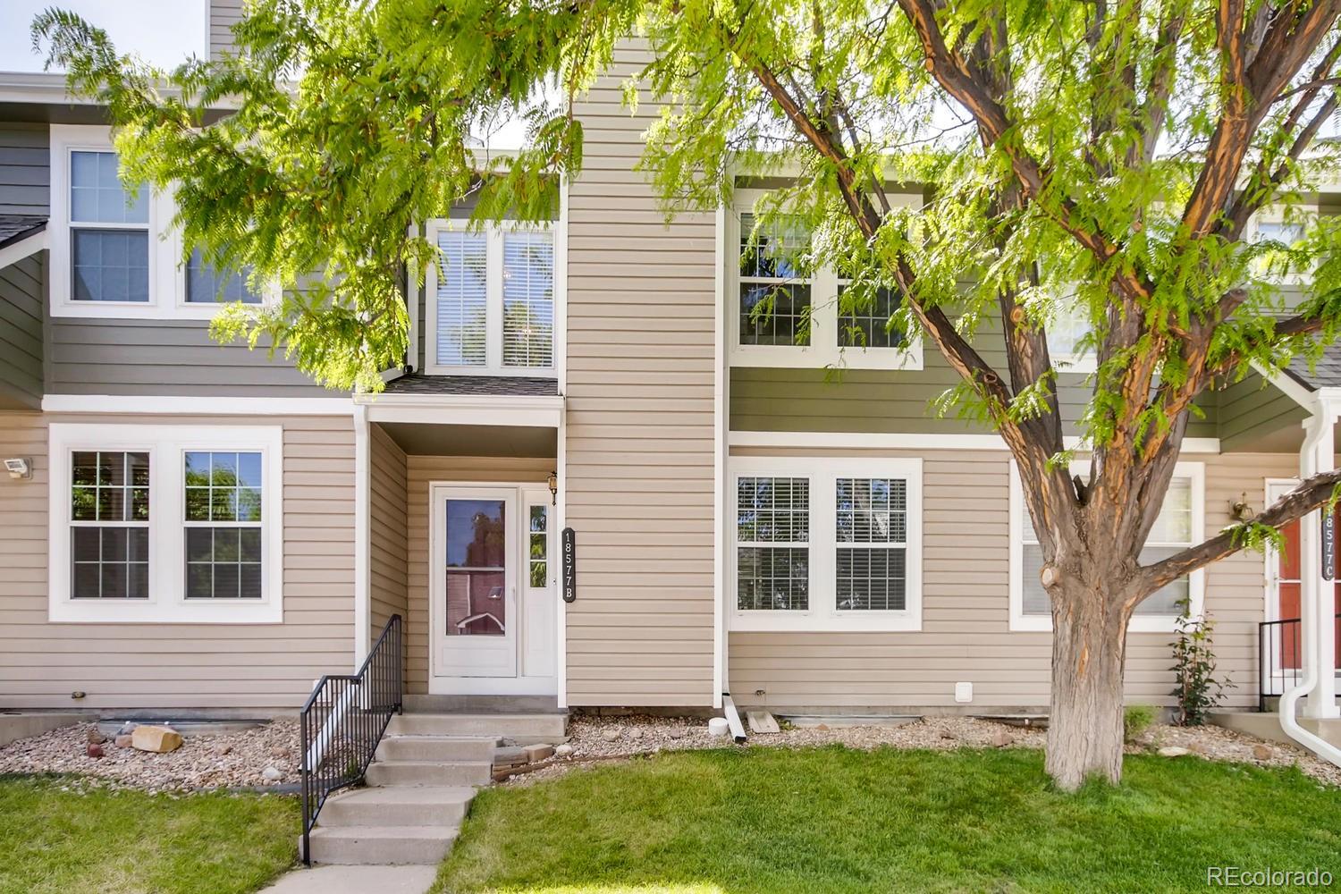 front view of house with a yard