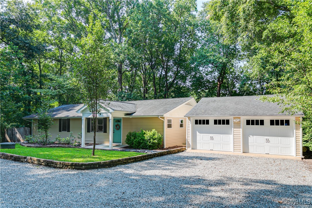 front view of a house with a yard