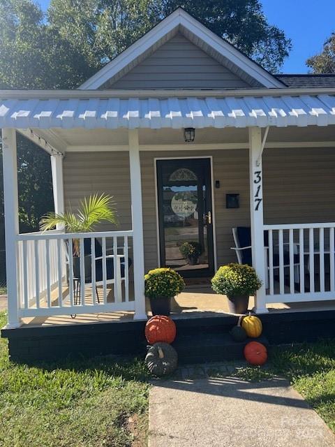 a front view of a house with porch